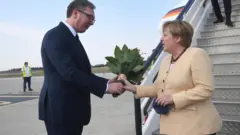 Vučić, Merkel