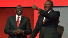 ኡሁሩ ኬንያታ ( በቀኝ በኩል) እና ዊሊያም ሩቶ (በግራ በኩል)