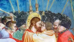 Un personnage biblique dont la tête est surplombée d'un halo en couleur jaune