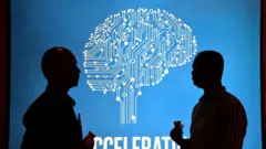 Участники Intel's Artificial Intelligence (AI) Day на фоне постера во время мероприятия в индийском городе Бангалор, 4 апреля 2017 года