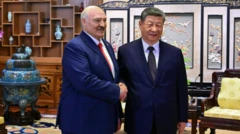 Беларус президенти Александр Лукашенко менен Кытай төрагасы Си Цзиньпин. 