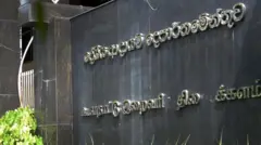 
A man walks in front of the Inland Revenue Department in Sri Lanka on December 7, 2024. 