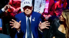 Доналд и Меланија Трамп на борилачком догађају одржаном испред Беле куће у Вашингтону