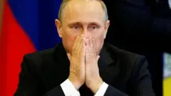 Путін