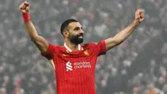 Mohamed Salah celebrates scoring for Liverpool