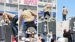 İzmir'de Özgür Özel'in mitingi öncesinde polis müdahalesi sırasında TOMA'ya çıkan öğretmen
