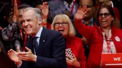 ማርክ ካኒ ዓወቱ እናጸንበለ