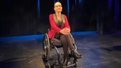 žena u invalidskim kolicima