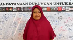 Haeriah, 53 tahun, masih menantikan realisasi janji pemerintah dan Jakpro setelah ia kehilangan tempat tinggal dan lahan pertaniannya di Kampung Bayam.