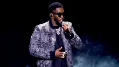 Sean "Diddy" Combs in a photograph on stage during performance 