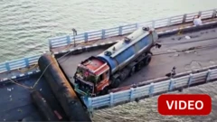 குஜராத்தில் இடிந்த பாலத்தில் தொங்கியபடி இருந்த லாரி மீட்கப்பட்டது எப்படி?
