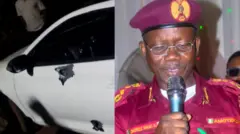 Ọga Amotekun, Isaac Omoyele mu ẹrọ gbohun-gbohun lọwọ, o wọ aṣọ iṣẹ rẹ