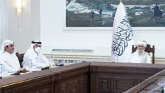 د قطر د بهرنيو چارو وزير له محد حسن سره