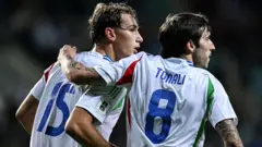 Jogadores italianos comemorando