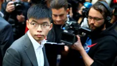 黄之锋被香港国安警察起诉“勾结外国势力”罪  可能面临终身监禁