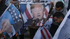 متظاهرون يحرقون صور ترامب ونتنياهو