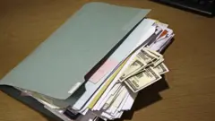 ملف به أموال