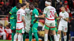 players of senegal and morocco face off 