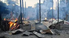 မီးရှို့ဖျက်ဆီးခံထားရတဲ့ကျေးရွာတရွာ