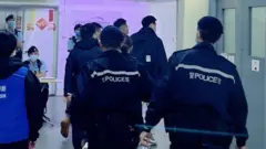 Police arriving at Stand News