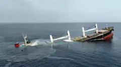 ኤተርኒቲ ሲ መርከብ ሲሰጥም የሚያሳይ ፎቶ