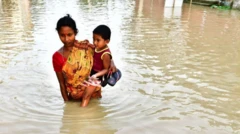 Aldeões indianos abandonam suas casas por causabetano yankeeenchentes após forte chuva no vilarejobetano yankeeBaldakhal, nos arredoresbetano yankeeAgartala, capital do estadobetano yankeeTripura, no nordeste da Índia,betano yankeenovembrobetano yankee2008