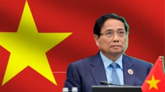 Thủ tướng Phạm Minh Chính với hình nền lá cờ Việt Nam 