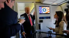 Трамп АҚШ президенти самолётида