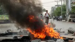 protest against the military coup in Mandalay, Myanmar, 21 March 2021.