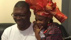 Oloogbe Diya ati ọmọ rẹ, Comfort