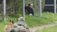 Peter Madsen is seen surrounded by police in Albertslund, Denmark October 20, 2020