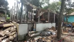 পুড়ে যাওয়া বাড়িটি