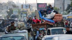 Palestinos huyendo de Rafah