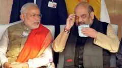 નરેન્દ્ર મોદી અને અમિત શાહ