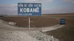 تابلوی به کوبانی خوش آمدید