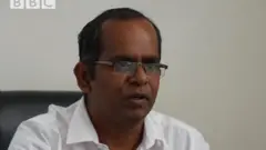 Dr Kaanaan Ambaalam