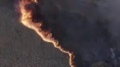 حريق هائل على بعد "كيلومتر واحد فقط" من مفاعل تشيرنوبل النووي