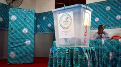 One man sidon wit box dem take dey count votes