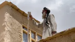 Əfqan kəndlilərin telefon siqnalını yaxşılaşdırmaq üsulu