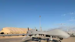 طائرة مسيرة أمريكية في قاعدة عين الأسد