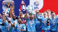 Coventry City celebrate after winning the Championship in 2025