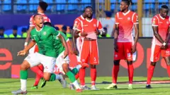A l'extrême gauche et en maillot vert, Marco Ilaimaharitra, l'auteur de l'unique but de la partie