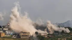 Smoke billows following an Israeli strike in Nabatieh, Lebanon.