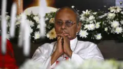 Archbishop of Colombo, Cardinal Malcolm Ranjith looks on during a candle light vigil in memory of the victims in Colombo on April 28, 2019, a week after a series of bomb blasts targeting churches and luxury hotels on Easter Sunday in Sri Lanka. - Sri Lanka's churches remained shut on April 28 forcing Christians to say prayers of grief in private over the Easter suicide attacks that the country's Roman Catholic leader called "an insult to humanity".