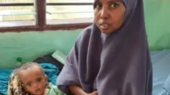 ኒምኮ በማእከሉ ውስጥ አልጋ የሚቀርብላት ሲሆን አልጋውን እንደሷ ችግር ላይ የወደቀ ልጅ ካላት ሌላ እናት ጋር ትጋራዋለች