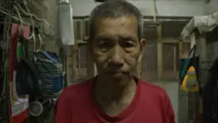 香港「籠屋」居民馮先生