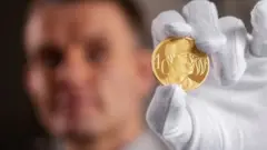 Монета с лицом принца Уильяма