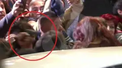 Пистолет, направленный на Киршнер в момент попытки покушения