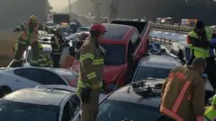 Damaged vehicles are seen after a crash on I-64 in York County, Virginia, December 22, 2019