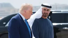 ترامب (يسار) مع محمد بن زايد (يمين)